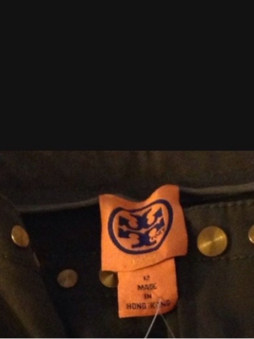 No tags I have were these pants Tory Burch Olive Pants with Gold Stud Accents